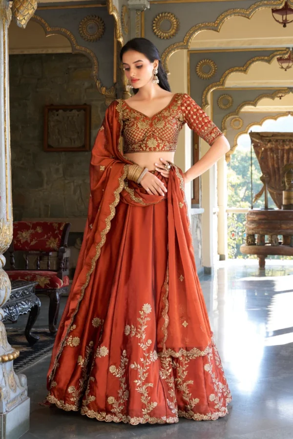 Rust Orange Rangoli Silk Lehenga Choli